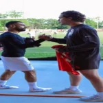 محمد صلاح يتبادل القمصان مع لاعب كرة أمريكي