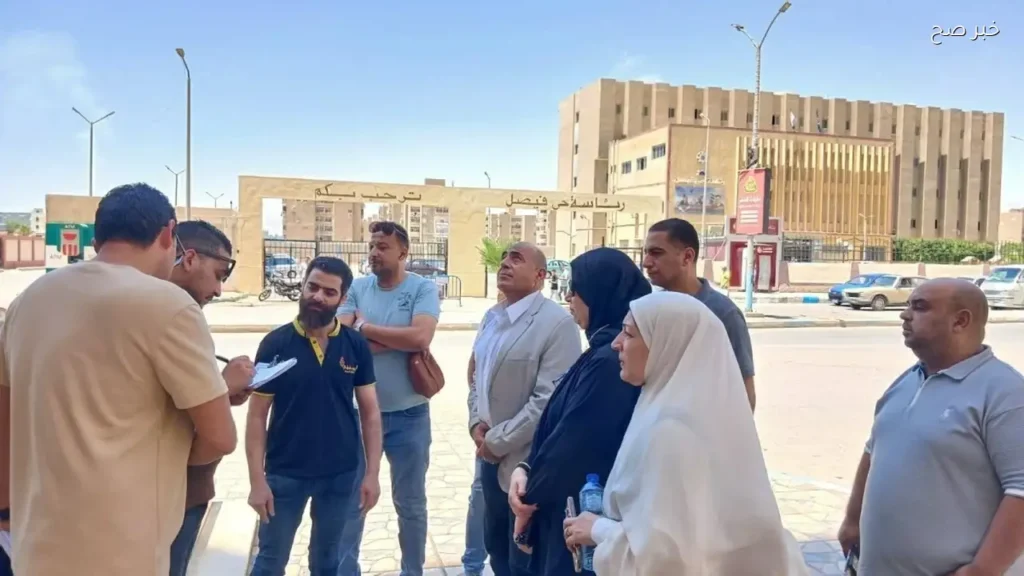 إلزام المحلات في حي فيصل بوضع صناديق قمامة وترخيص الإعلانات