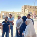 إلزام المحلات في حي فيصل بوضع صناديق قمامة وترخيص الإعلانات
